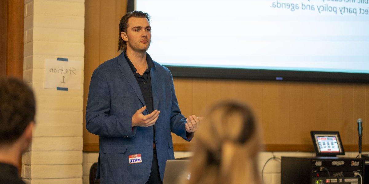 Student presenting at a conference